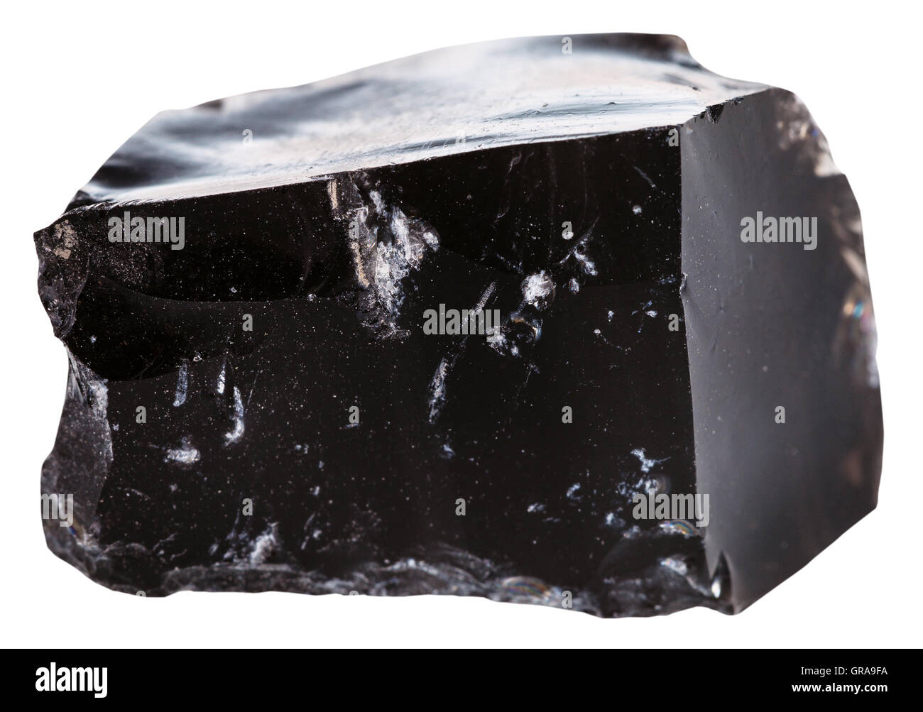 macro shooting of Igneous rock specimens - black obsidian (volcanic glass) stone isolated on white background Stock Photo
