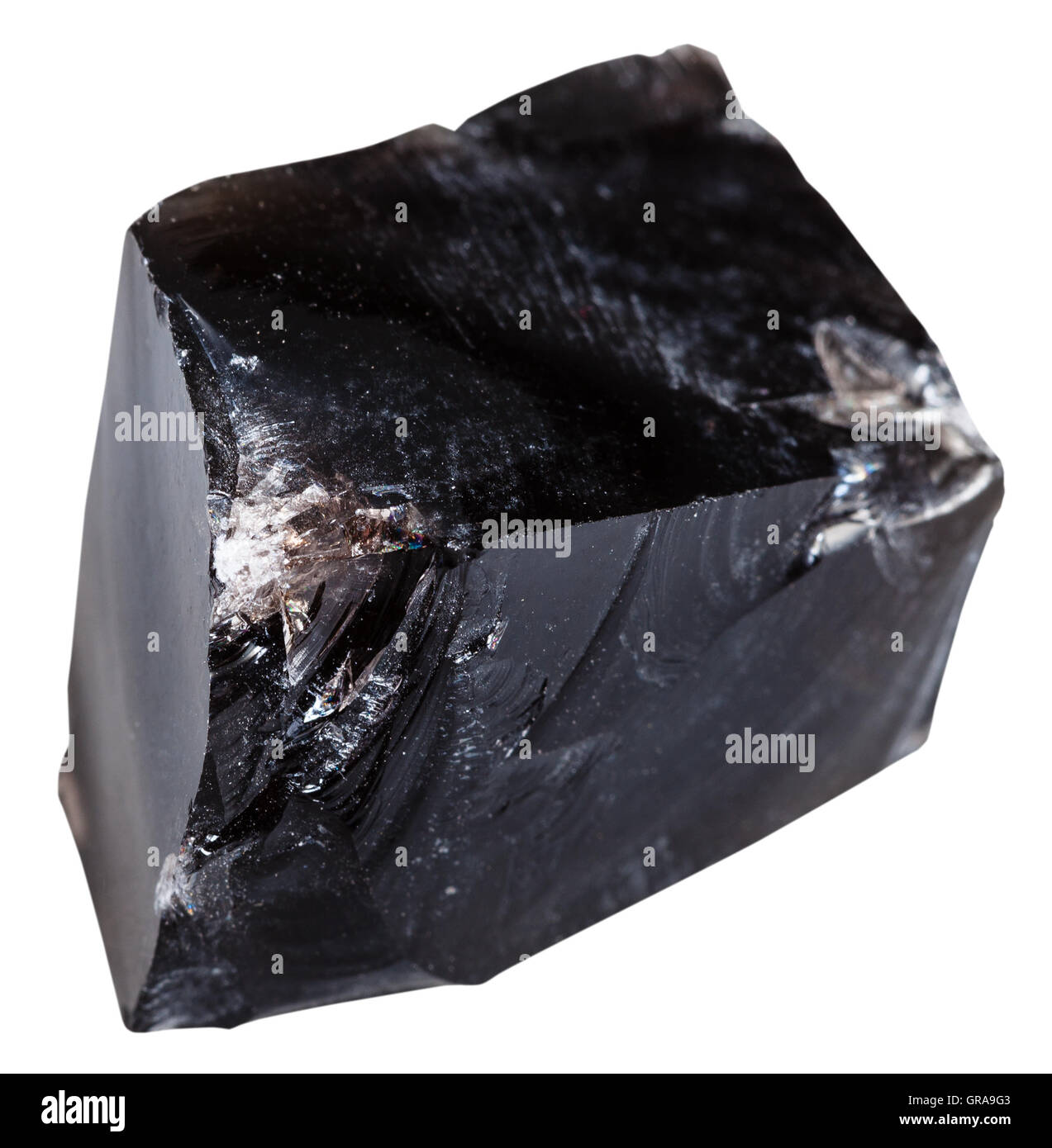 macro shooting of Igneous rock specimens - black obsidian (natural volcanic glass) stone isolated on white background Stock Photo