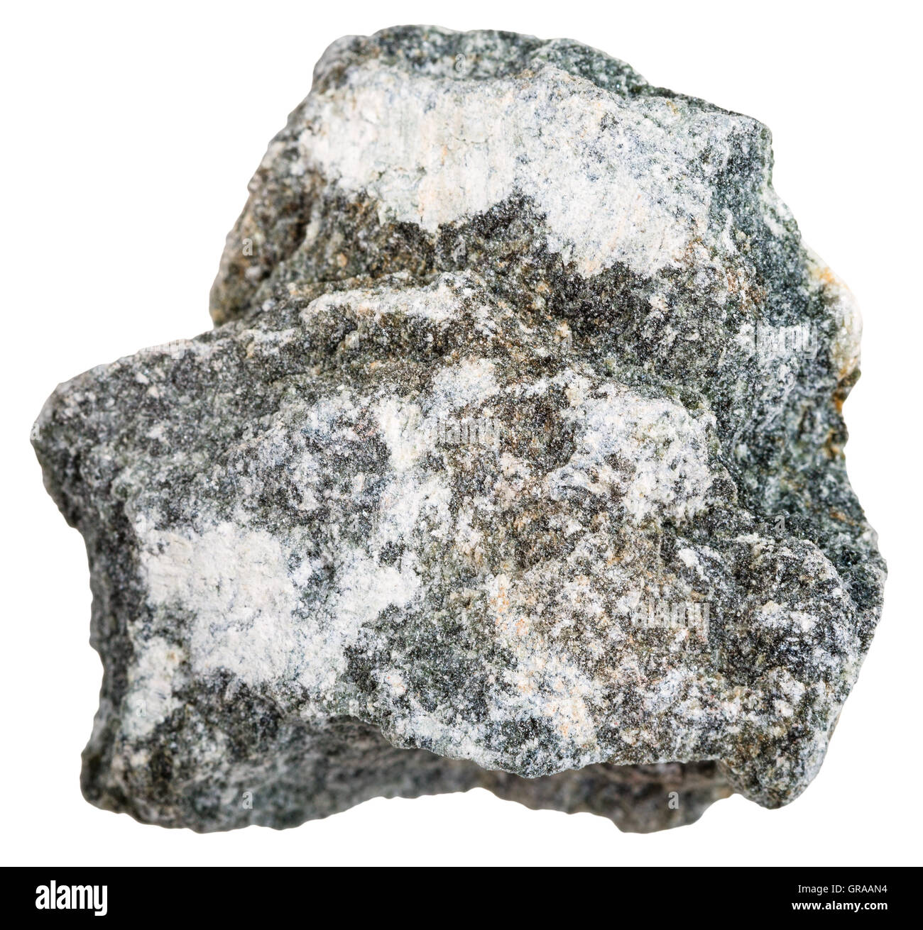 macro shooting of metamorphic rock specimens - soapstone (steatite, soaprock) mineral isolated on white background Stock Photo