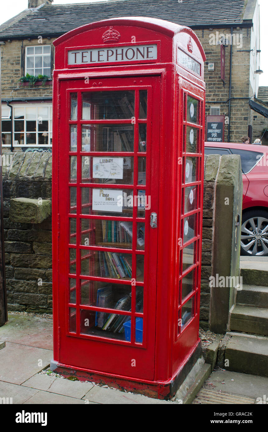 Traditional English red phone box, portrait Stock Photo