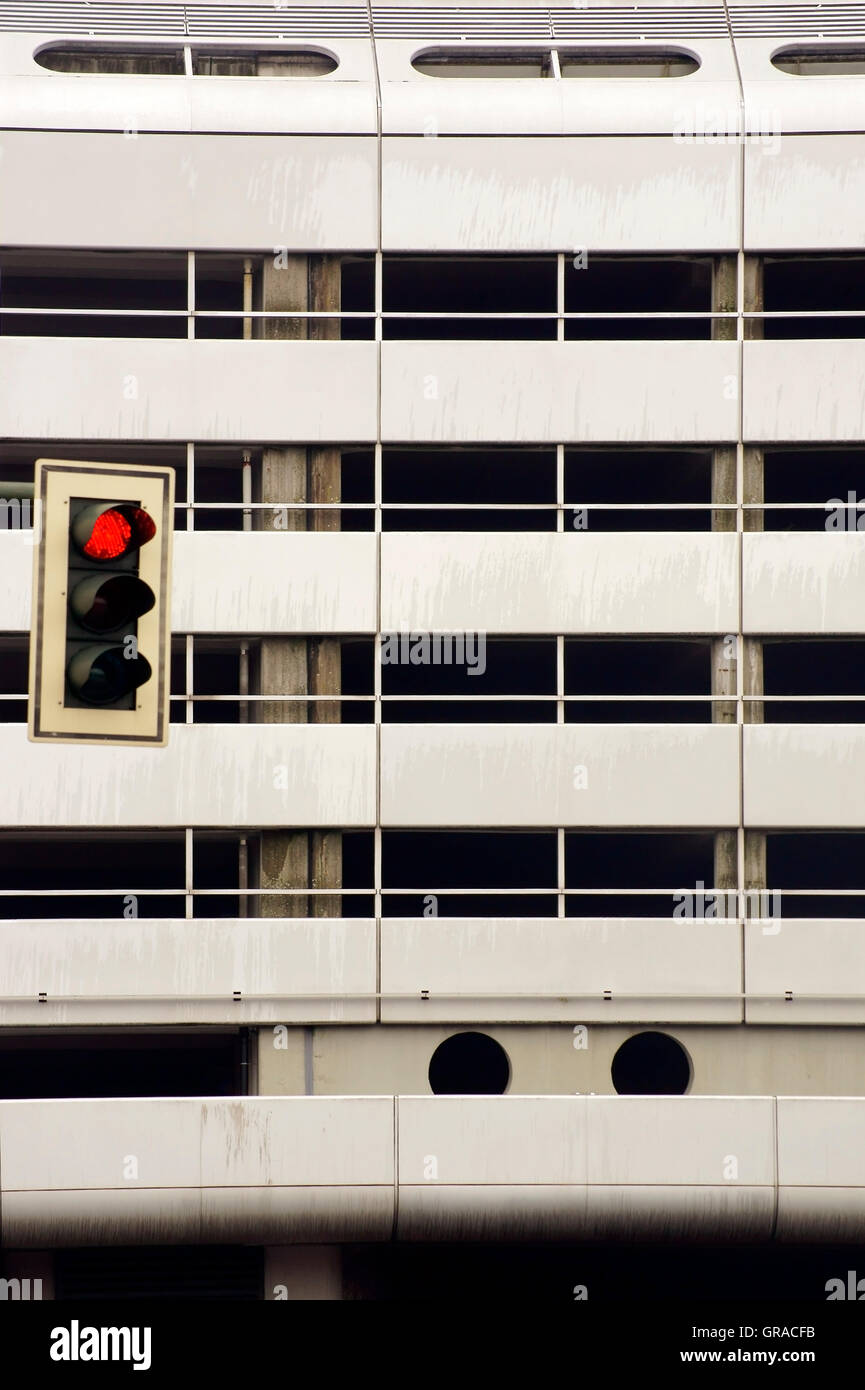 Traffic Light In Front Of Metal Facade Stock Photo
