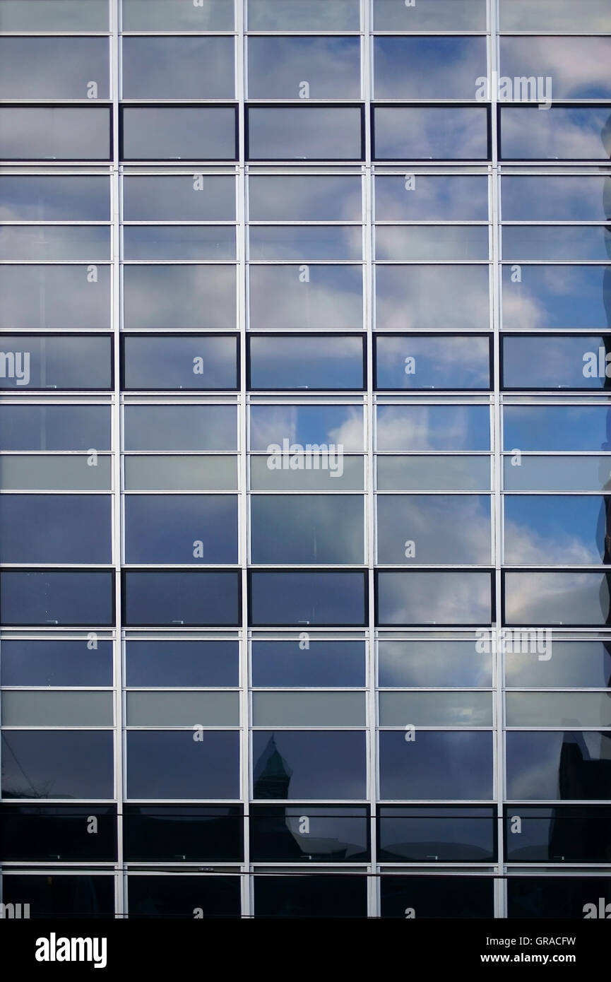 Facade With Clouds Reflections Stock Photo