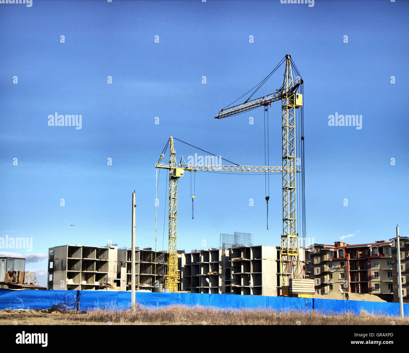 construction site with cranes for multifamily homes Stock Photo Alamy