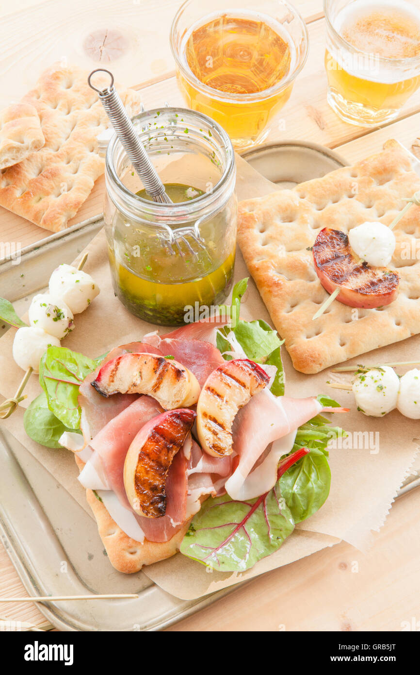 Sandwich With Smoked Ham And Grilled Peaches Stock Photo