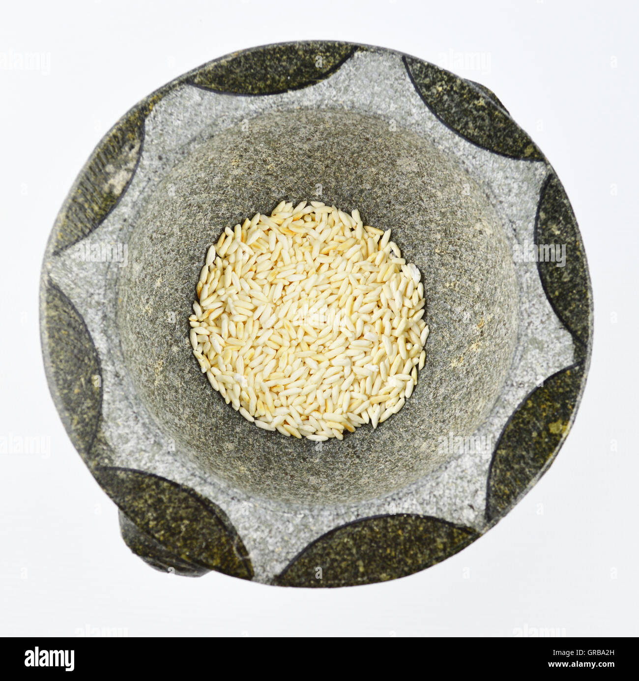 Parched rice in a mortar Stock Photo