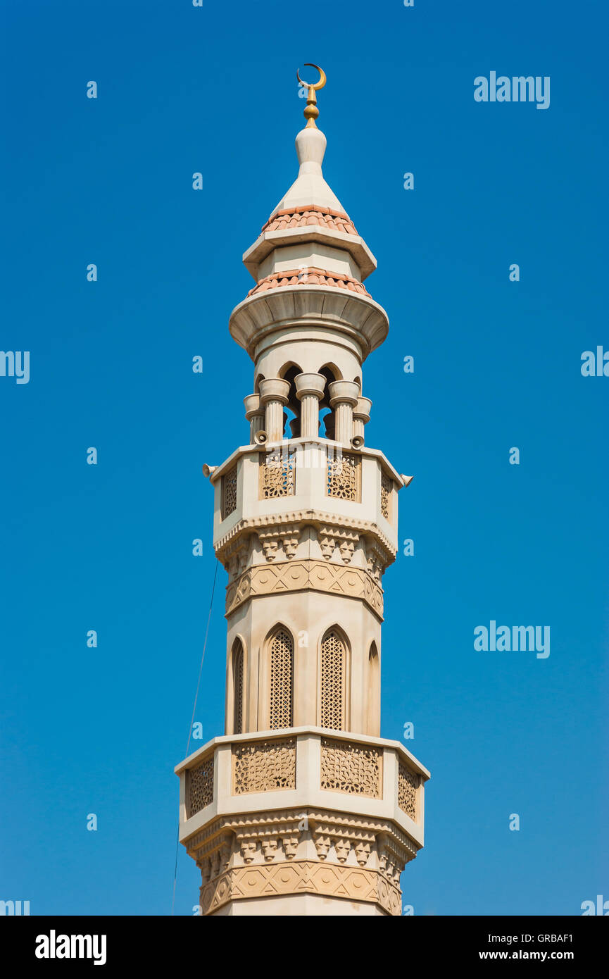 The minaret of a mosque Stock Photo