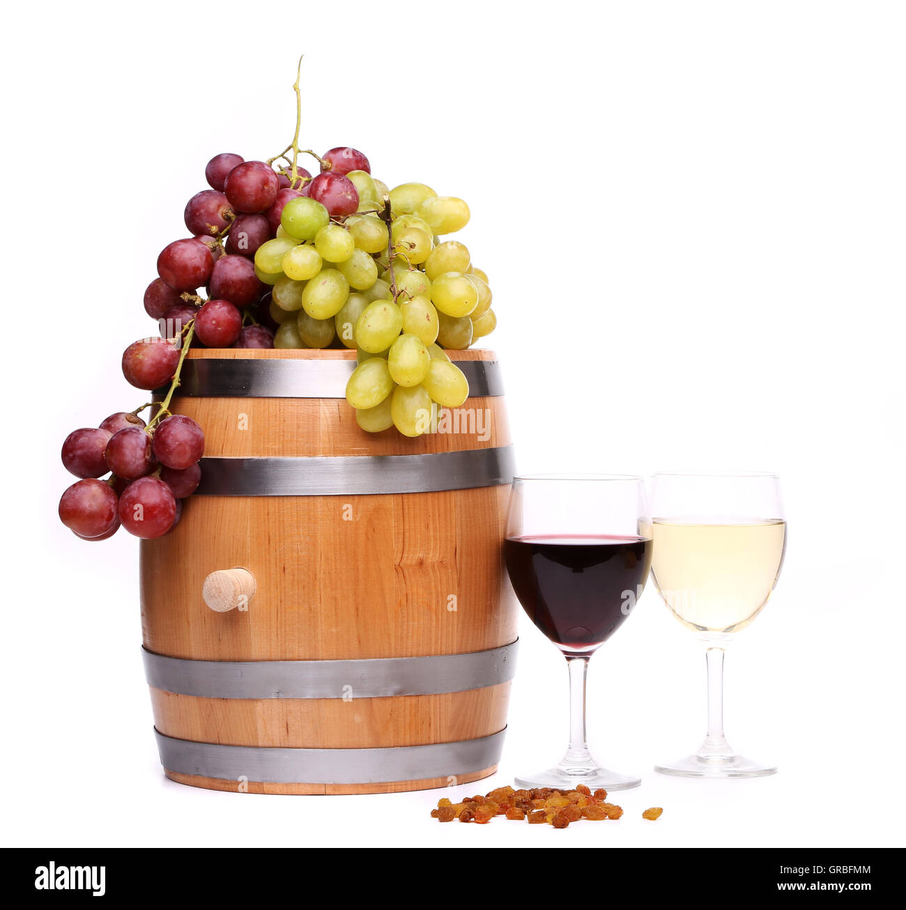 Grape on the barrel, glasses of wine, raisins Stock Photo