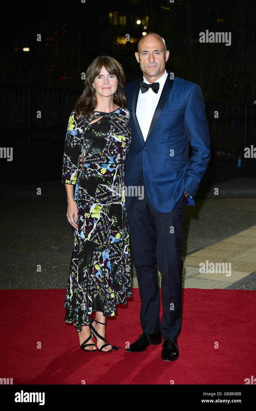 Mark Strong and Liza Marshall arriving at the GQ Men of the Year Awards 2016 held at The Tate Modern in London. PRESS ASSOCIATION Photo. Picture date: Tuesday September 6, 2016. See PA story SHOWBIZ GQ. Photo credit should read: Ian West/PA Wire Stock Photo