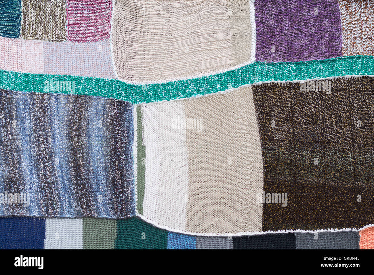 Colorful Knitted Parts Connected To A Patchwork Quilt Stock Photo - Alamy