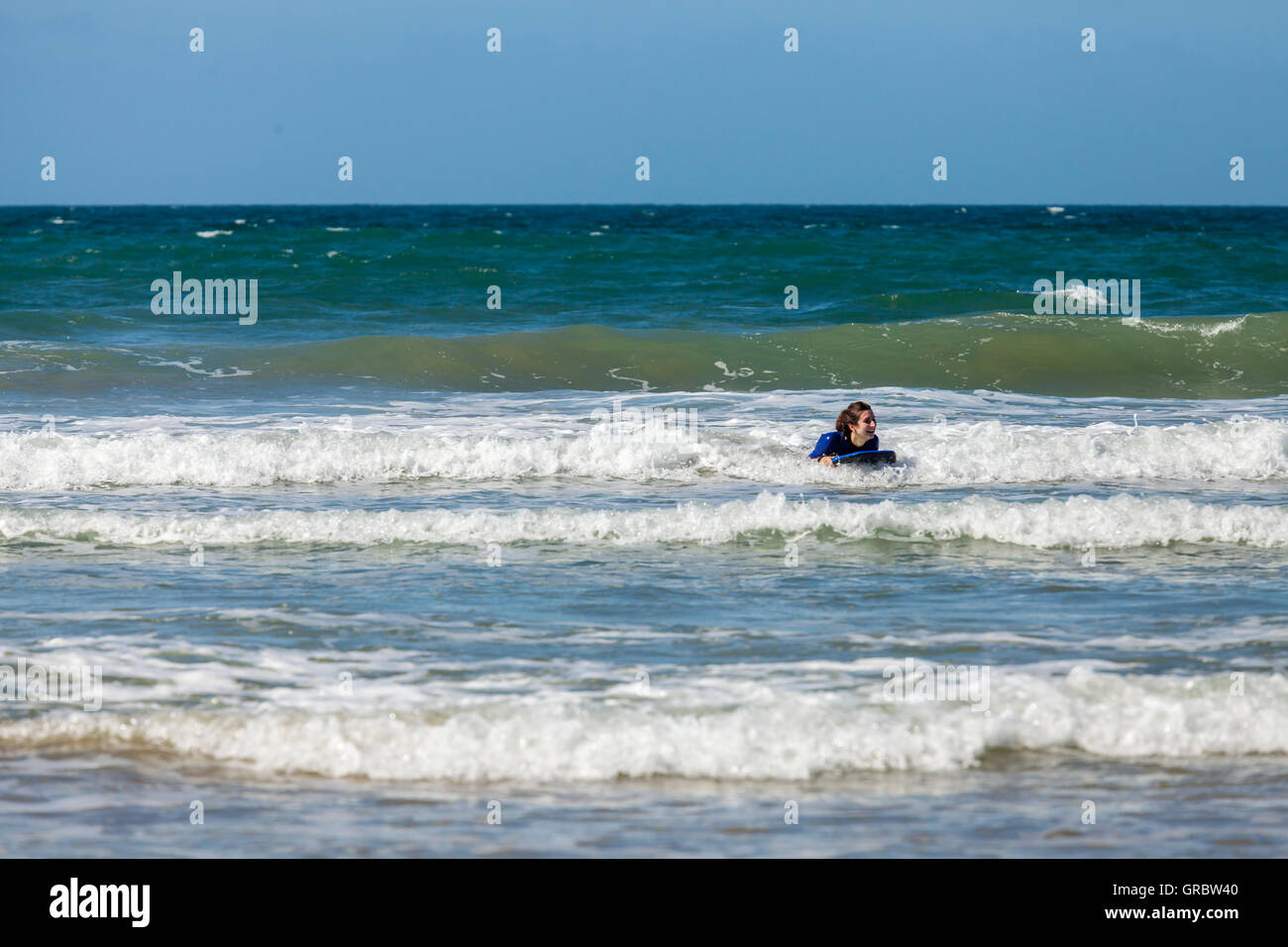 Body boarding on Druidstone Beach in Pembrokeshire Stock Photo - Alamy