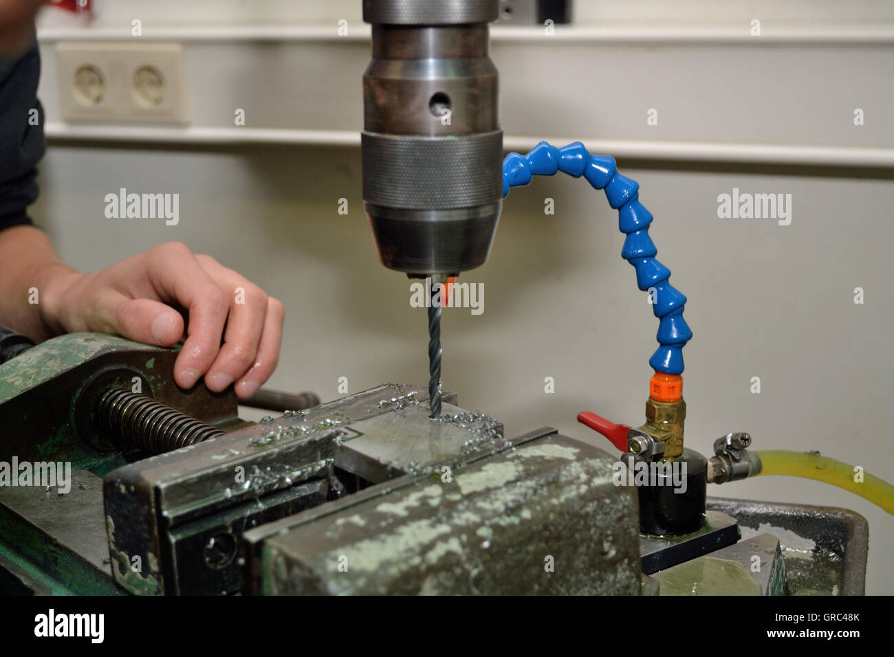 With Electric Drill Hole Is Drilled In Metal Stock Photo - Alamy