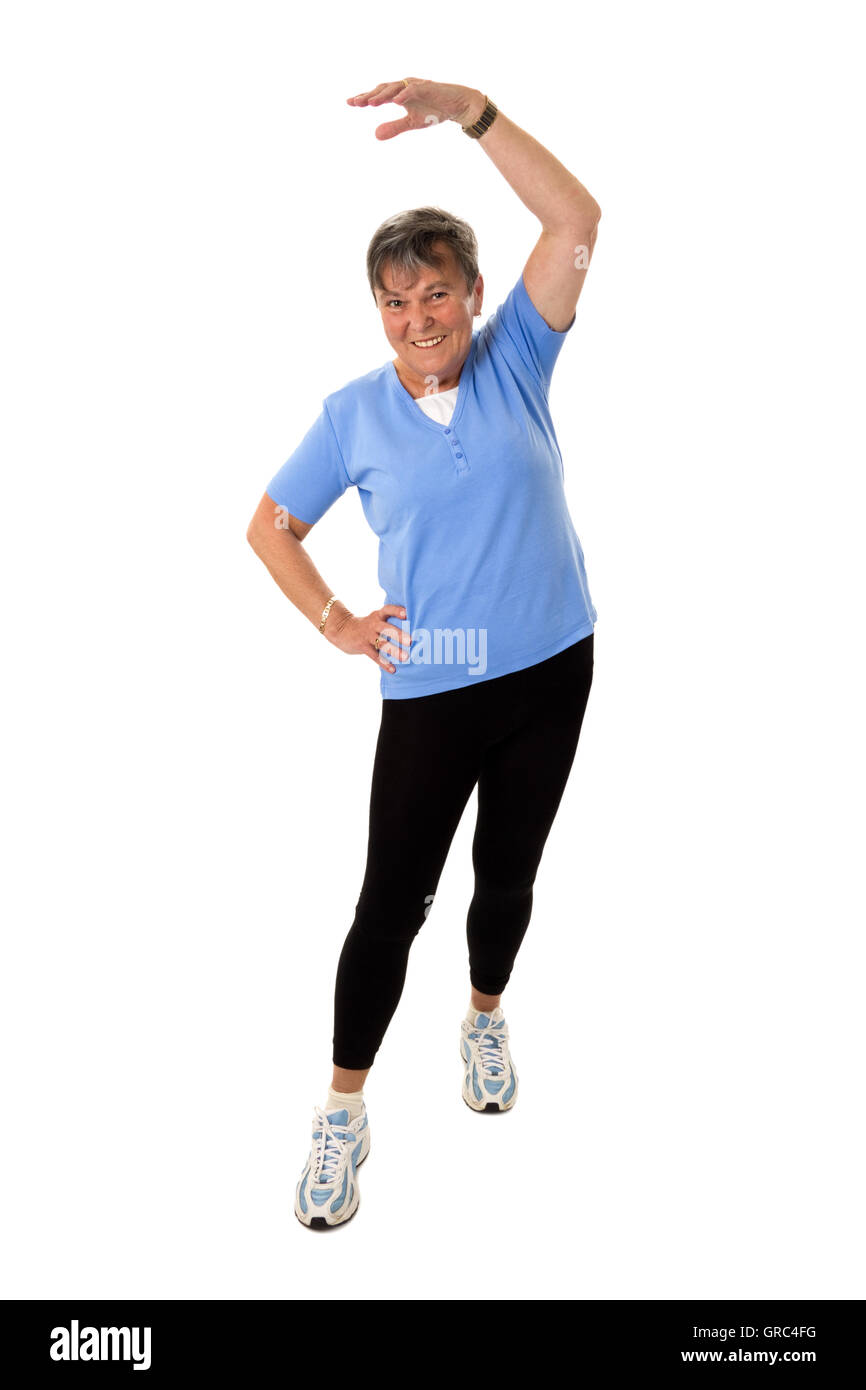 Senior Woman Doing Gym Exercises Stock Photo