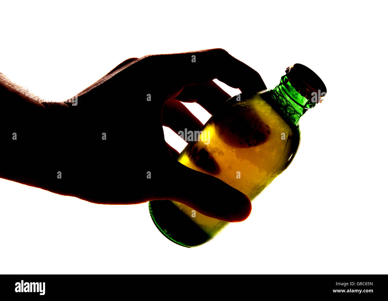 Silhouette of hand holding bottle of larger cutout Stock Photo