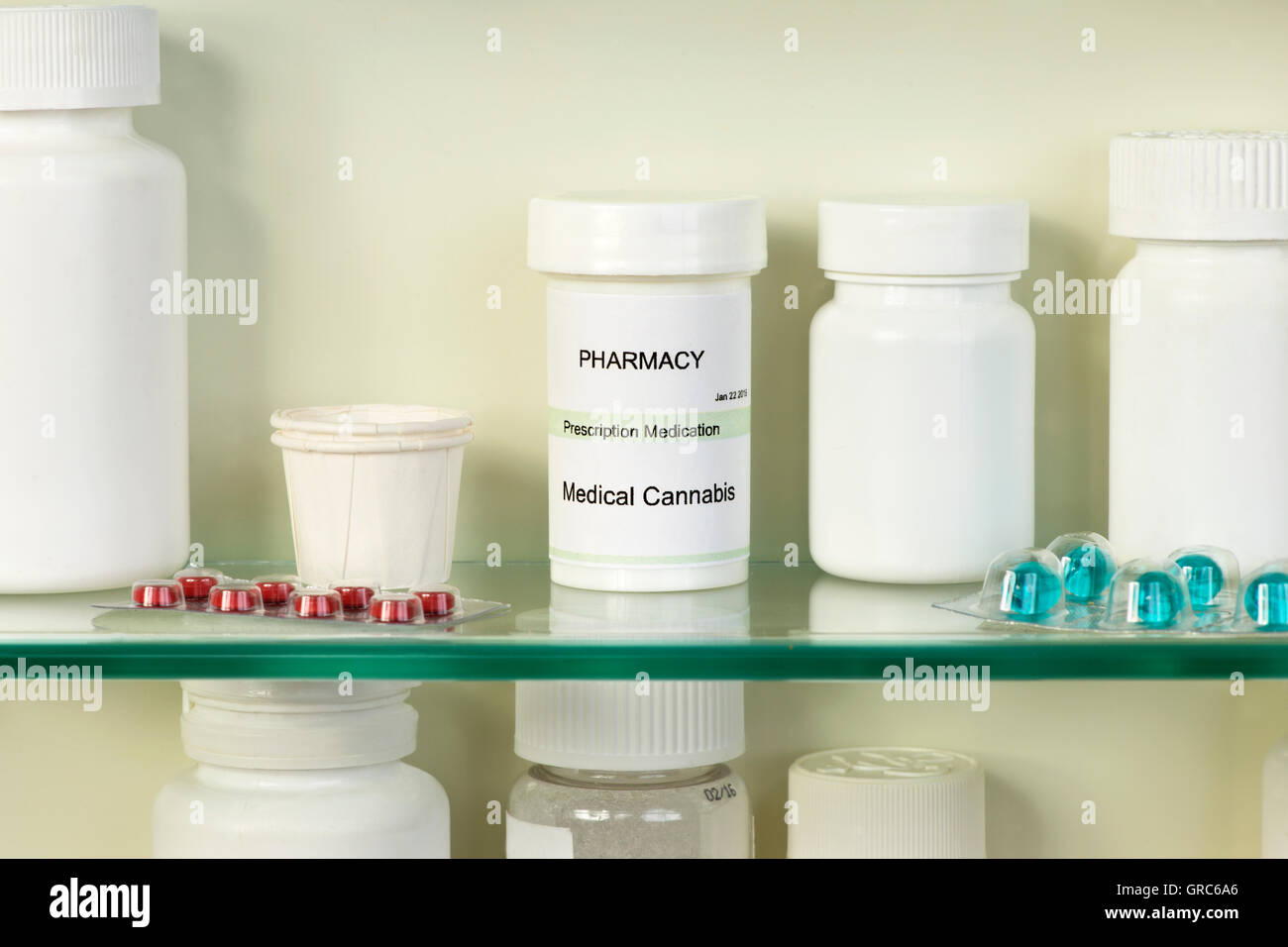 Medical Marijuana Container On Medicine Cabinet Shelf Labels Are