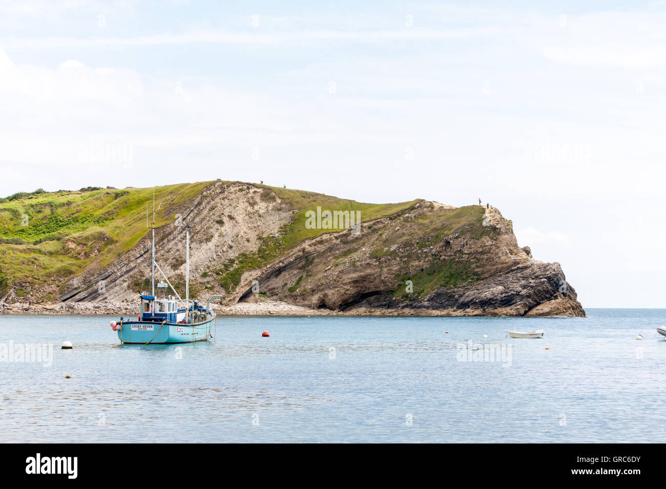 A view of a fishing boat at Lulworth Cove, Dorset, UK Stock Photo