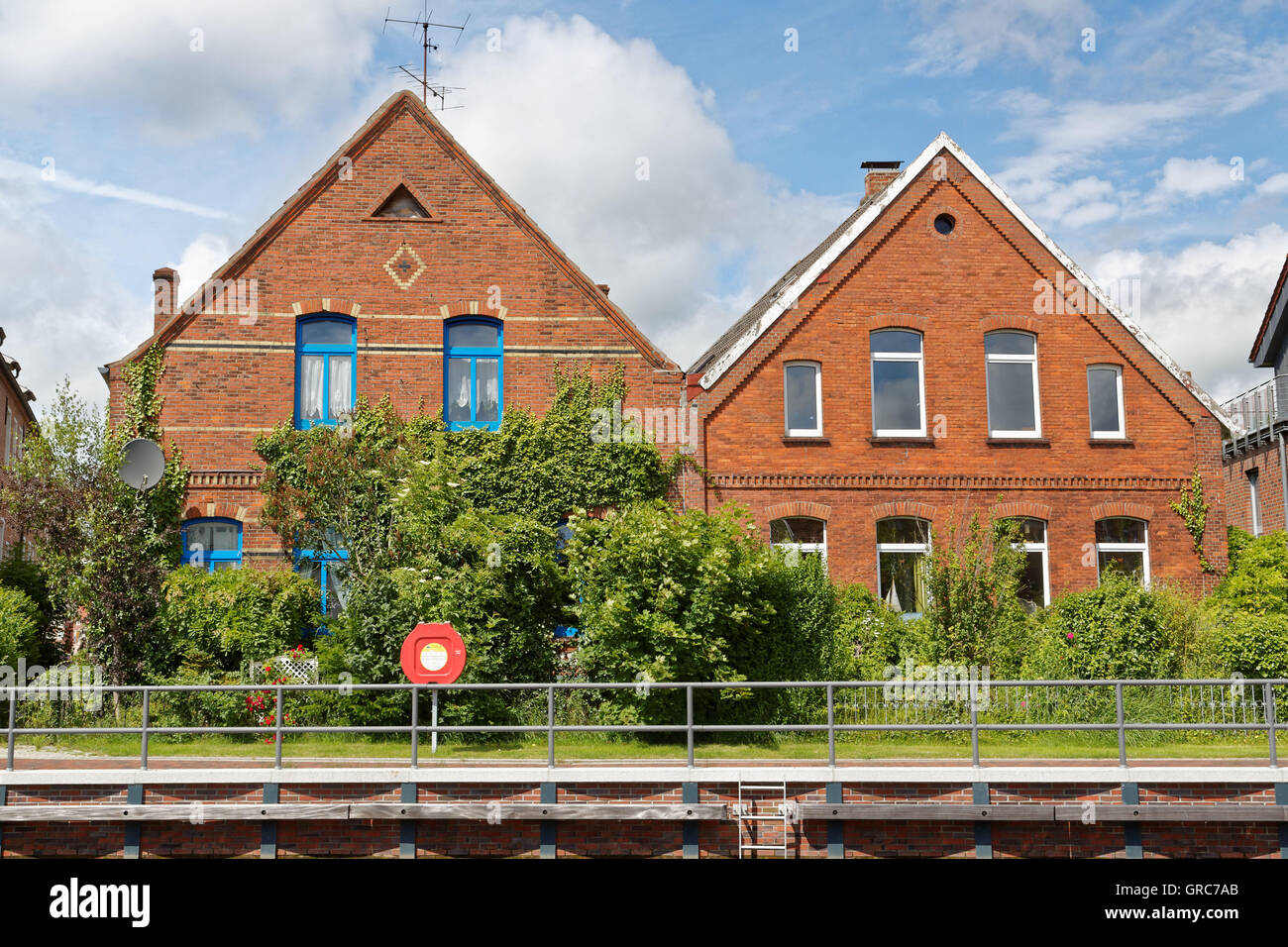Houses On The Red Siel In Emden Stock Photo Alamy