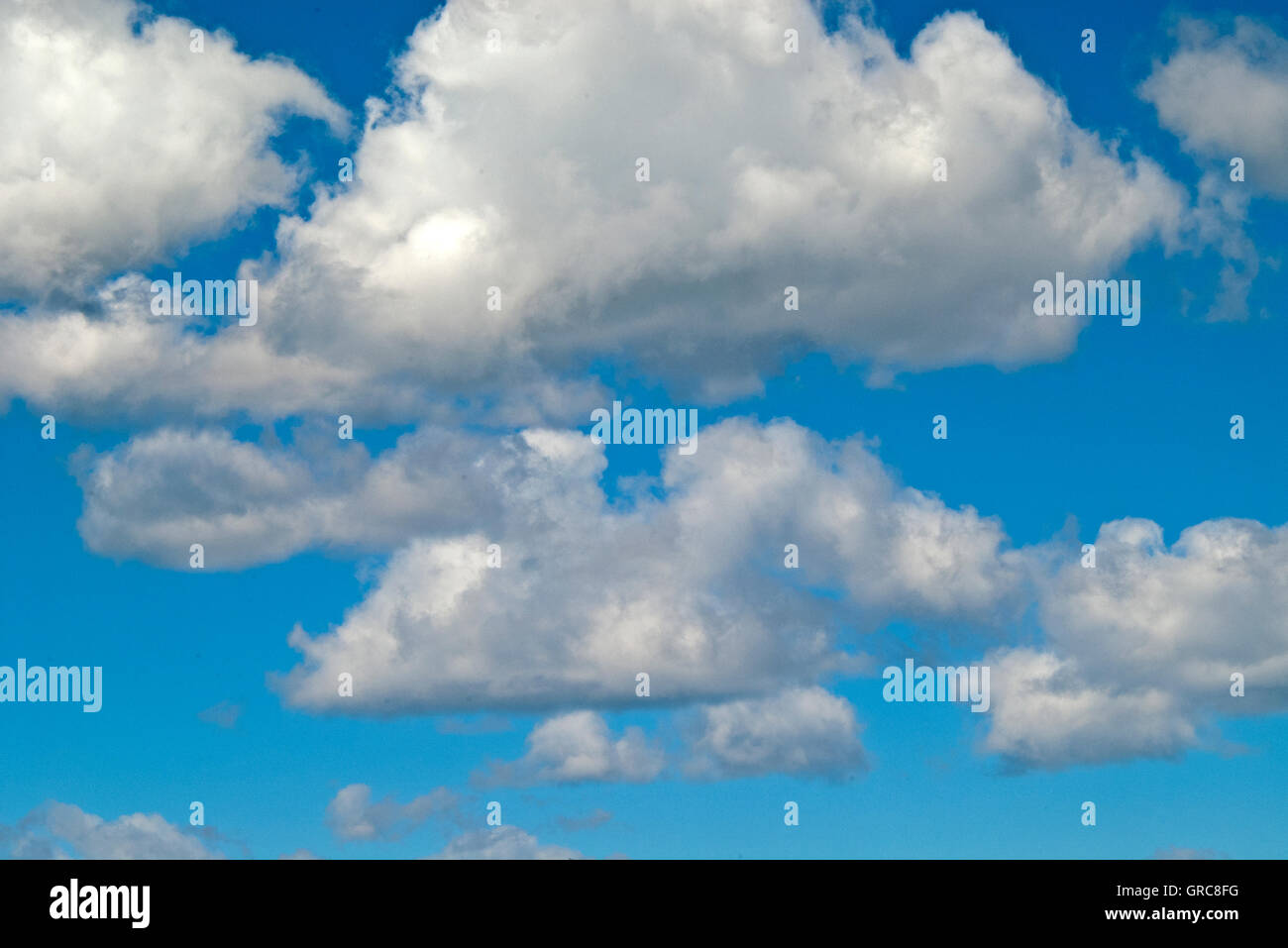 Cumulus cloud formation in blue sky Stock Photo