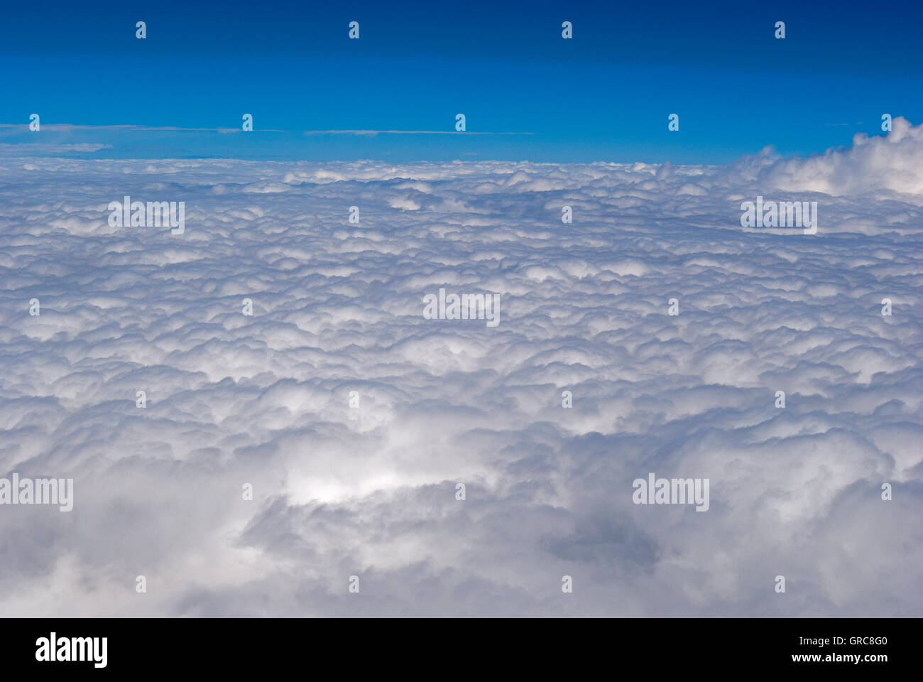 Full cloud cover taken from airplane window Stock Photo