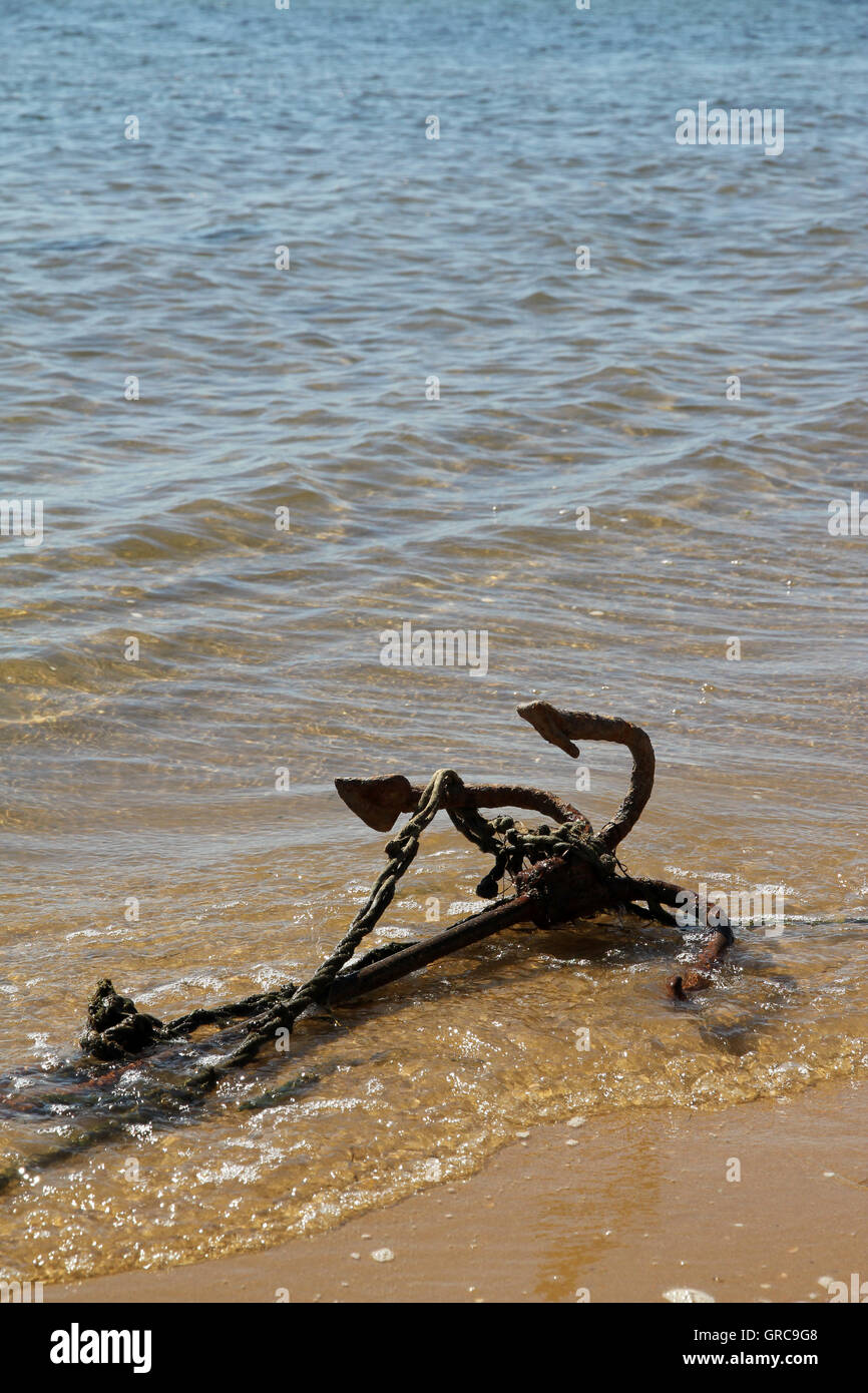 Anchor On The Beach Stock Photo