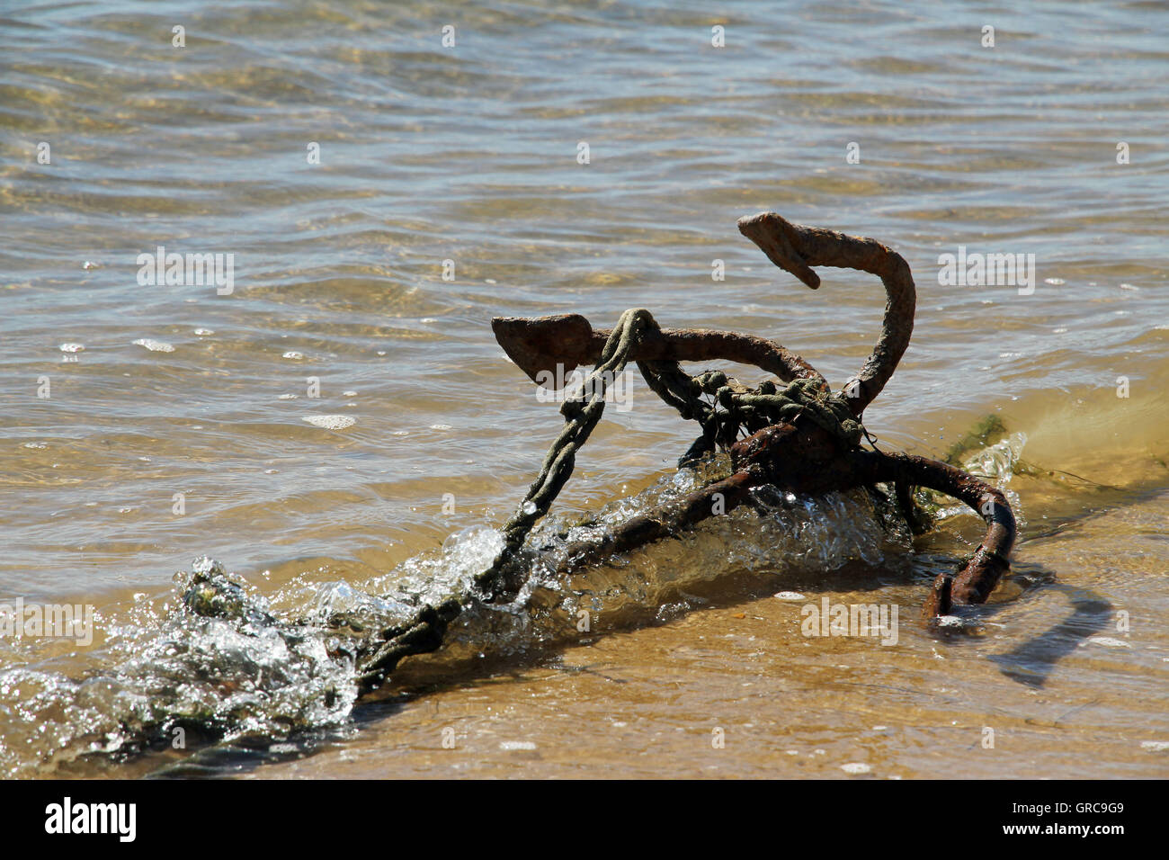 Anchor On The Beach Stock Photo