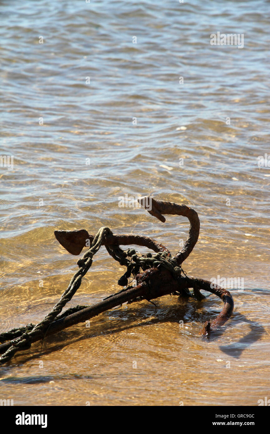 Anchor On The Beach Stock Photo