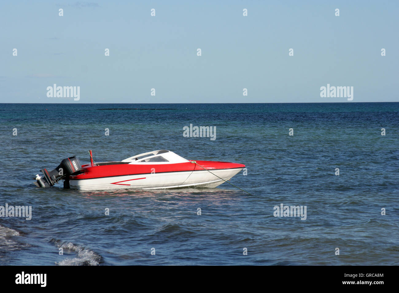 Red Motorboat On The Sea Stock Photo
