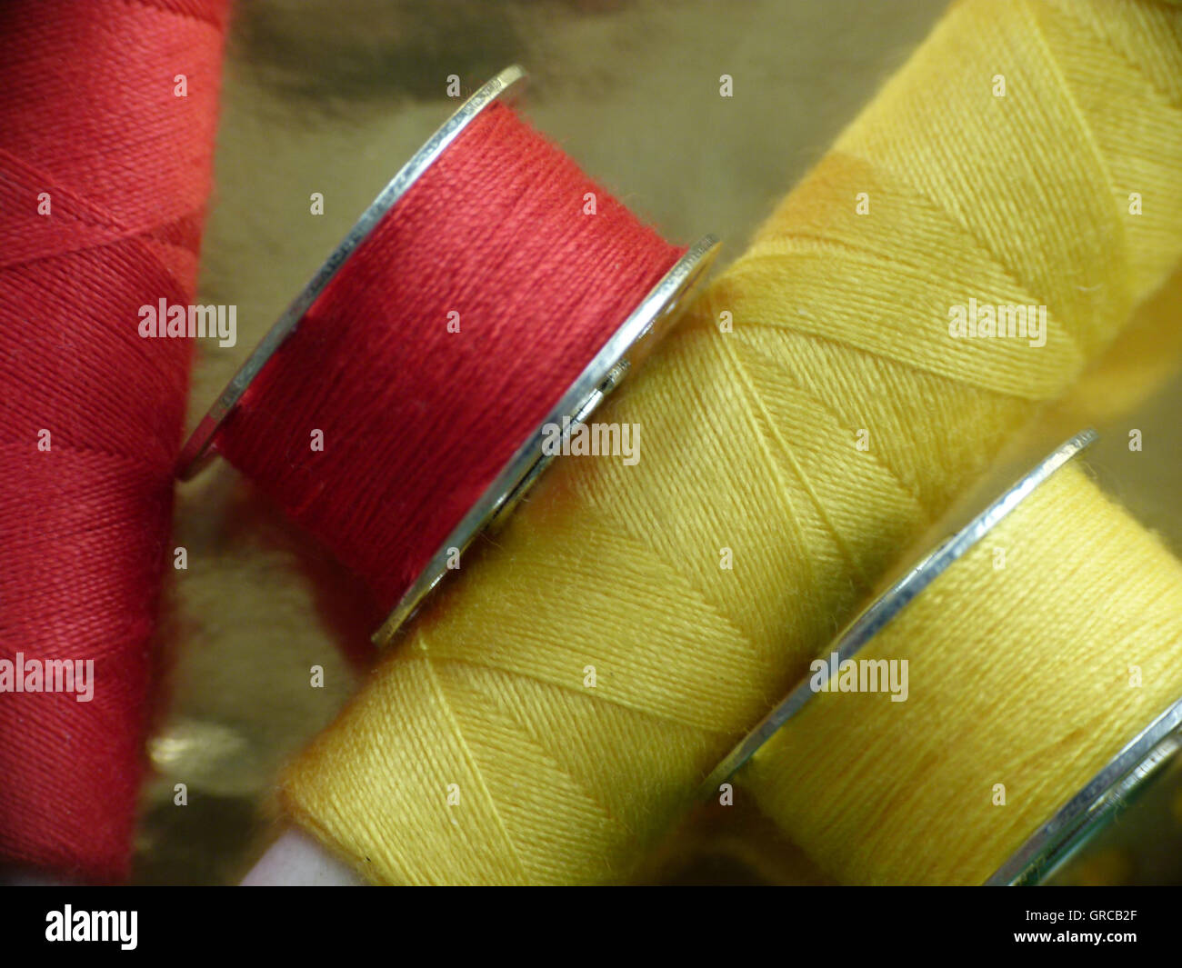 Red And Yellow Yarn Stock Photo - Alamy