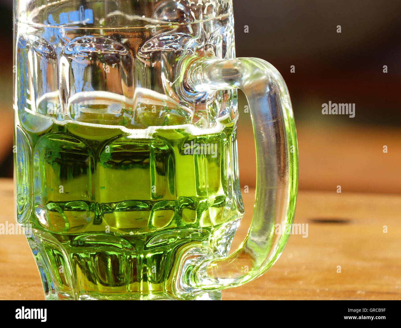 Glass Of Green Refreshment Drink, Beer With Green Woodruff Lemonade Stock Photo