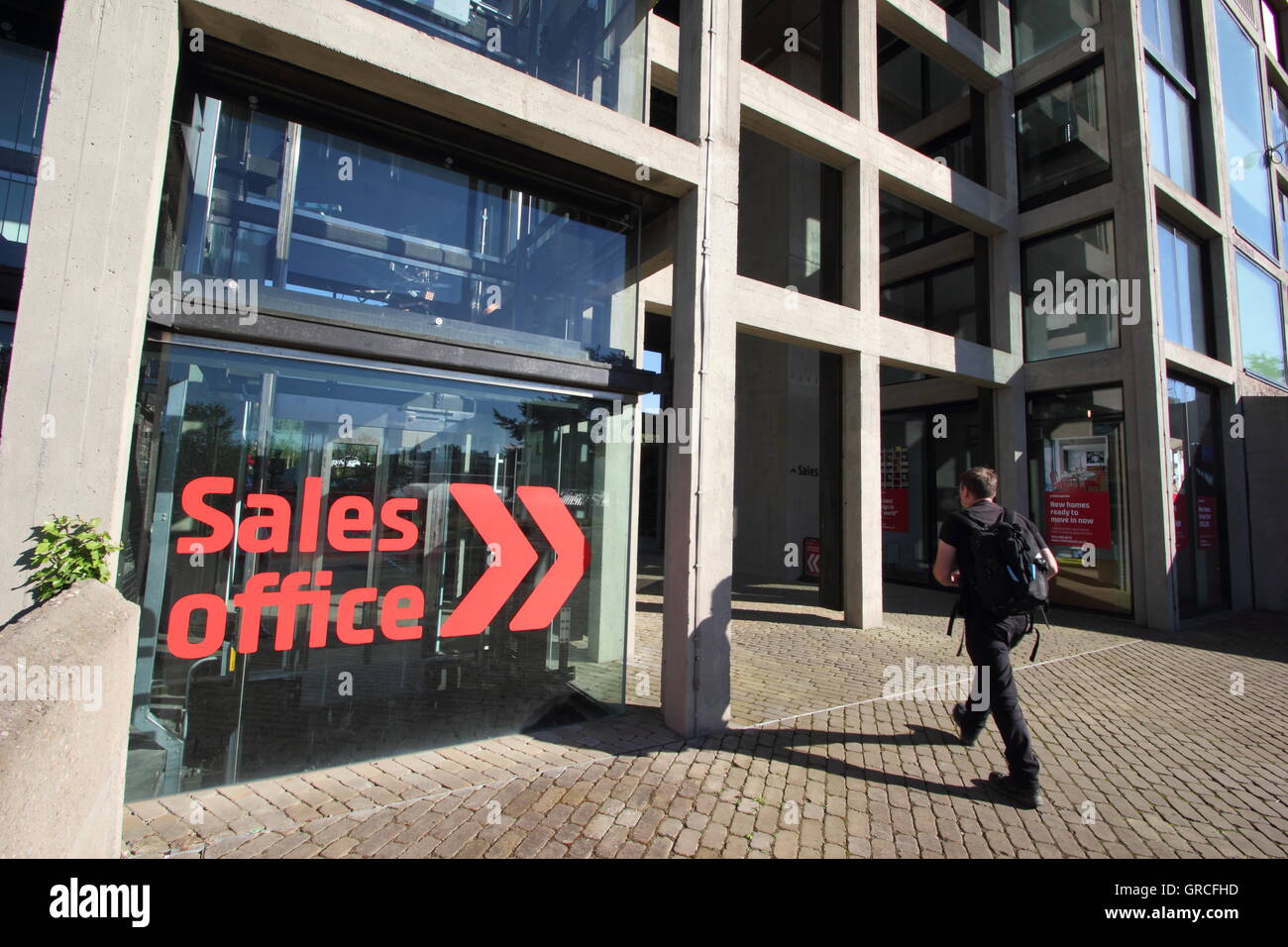 Signage points the way to the property sales office of the refurbished flank of Park Hill flats in Sheffield, Yorkshire  UK 2016 Stock Photo