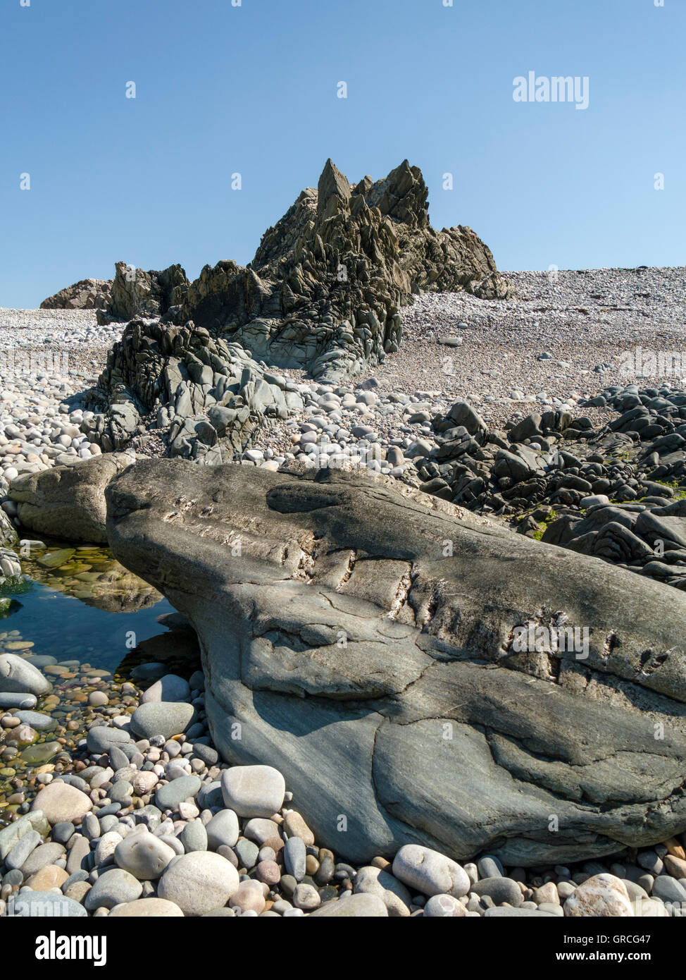 Raised pebble beach, Isle of Colonsay, Scotland, UK. Stock Photo