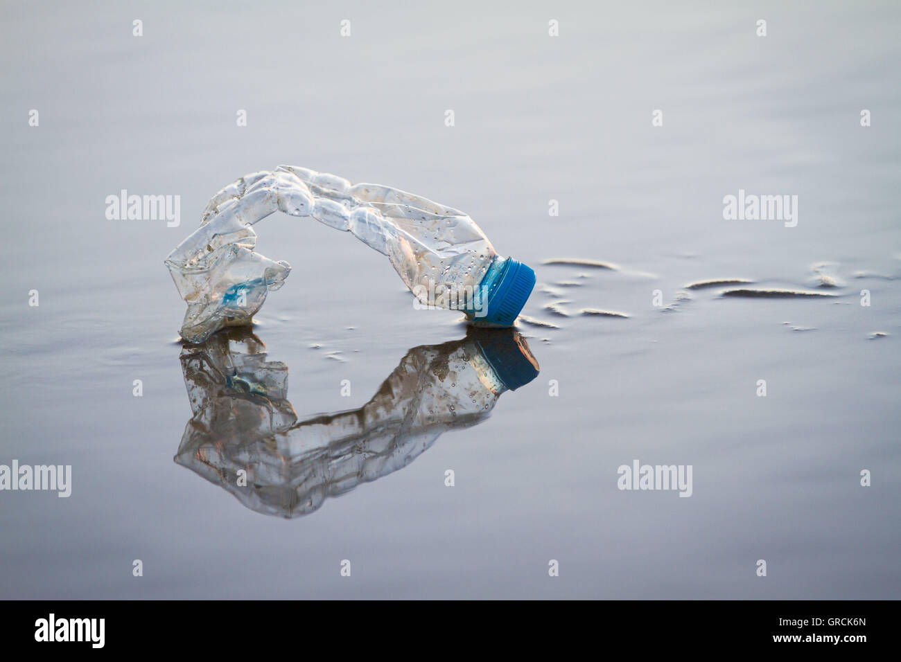 Plastic Bottle On The Beach Stock Photo