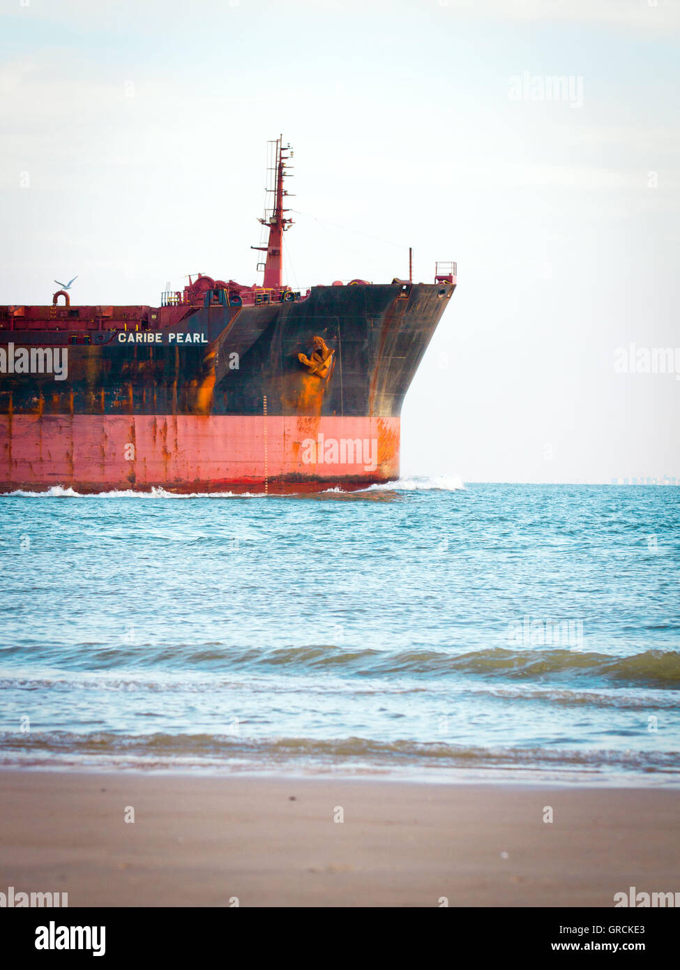 Rusty Cargo Ship, Irony Stock Photo