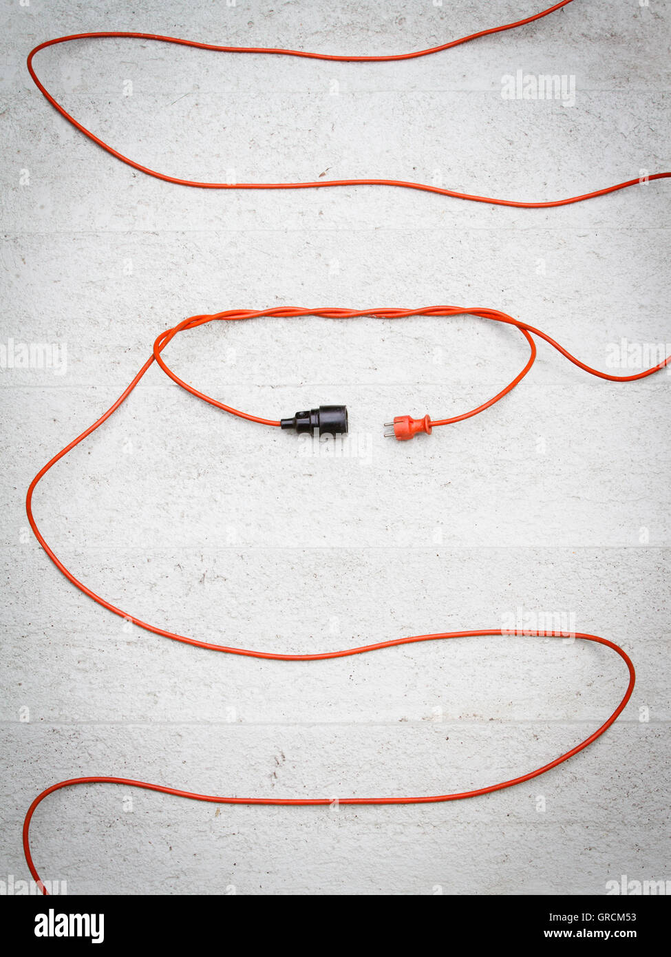 Electrifying Connection, Symbolically, Power Cord And Plug Stock Photo
