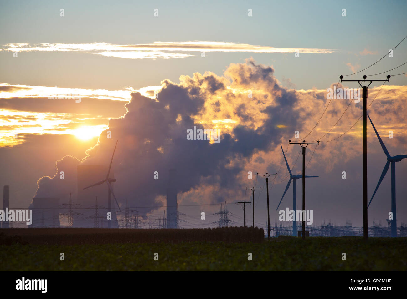 Coal Fired Power Plant Niederaußem In Sunset Stock Photo
