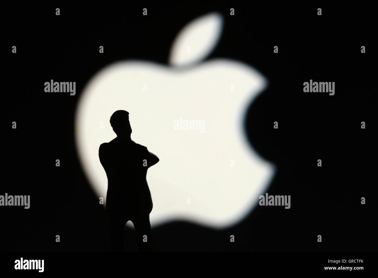 Apple Sign With Miniature Figure Stock Photo
