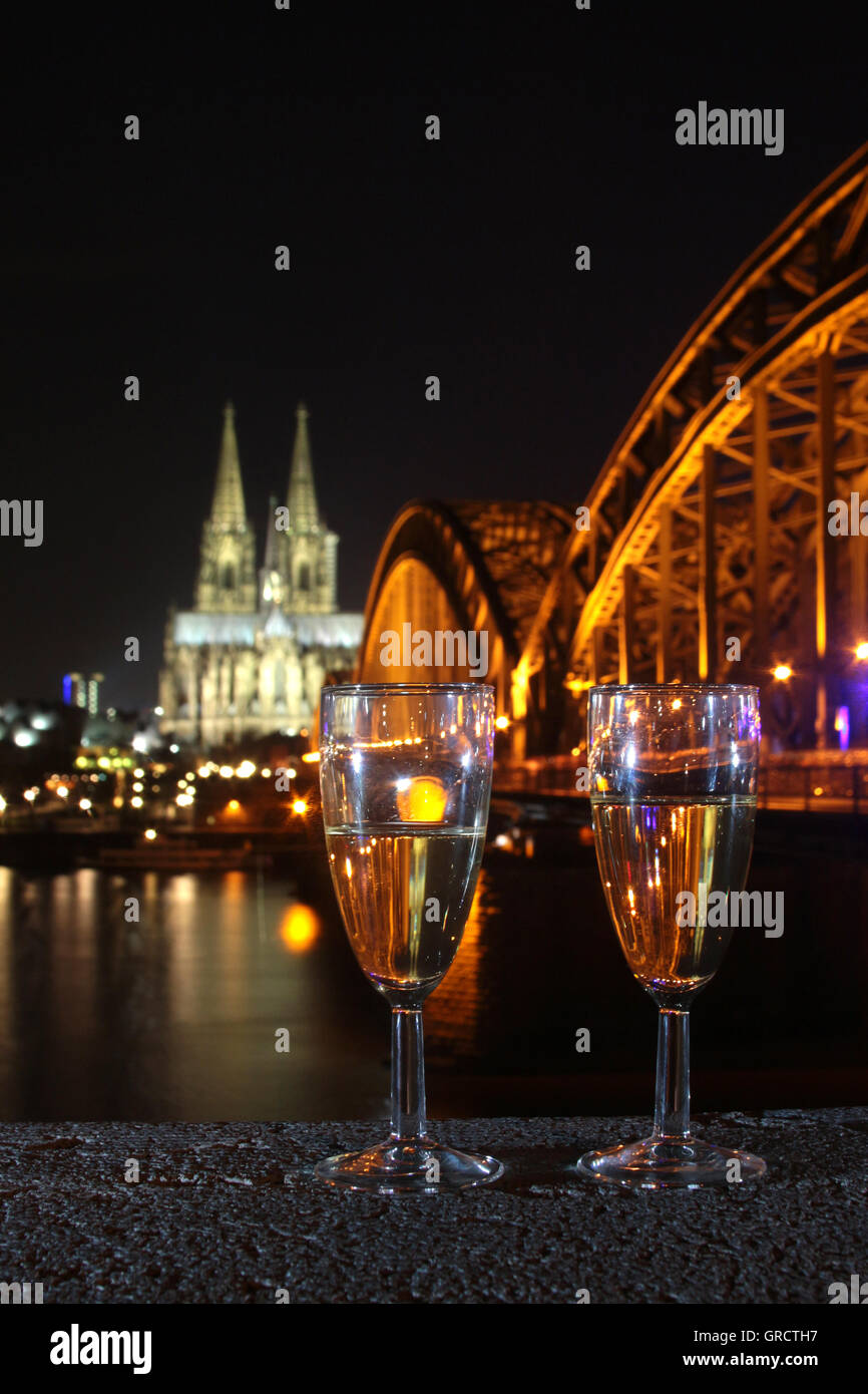 New Year S Eve At Cologne With Two Glasses Of Champagne With Cathedral And Bridge Stock Photo