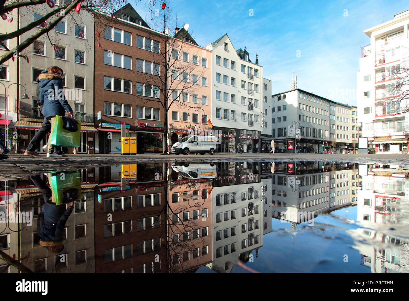 Place Alter Markt Reflecting In A Puddle In Cologne Stock Photo