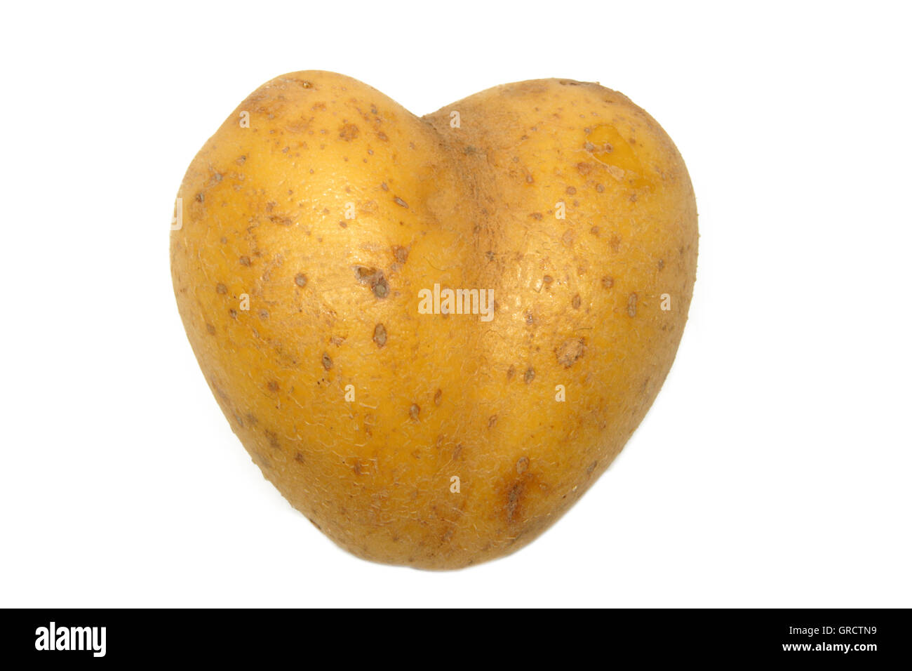 Potato With Heart Shape Stock Photo