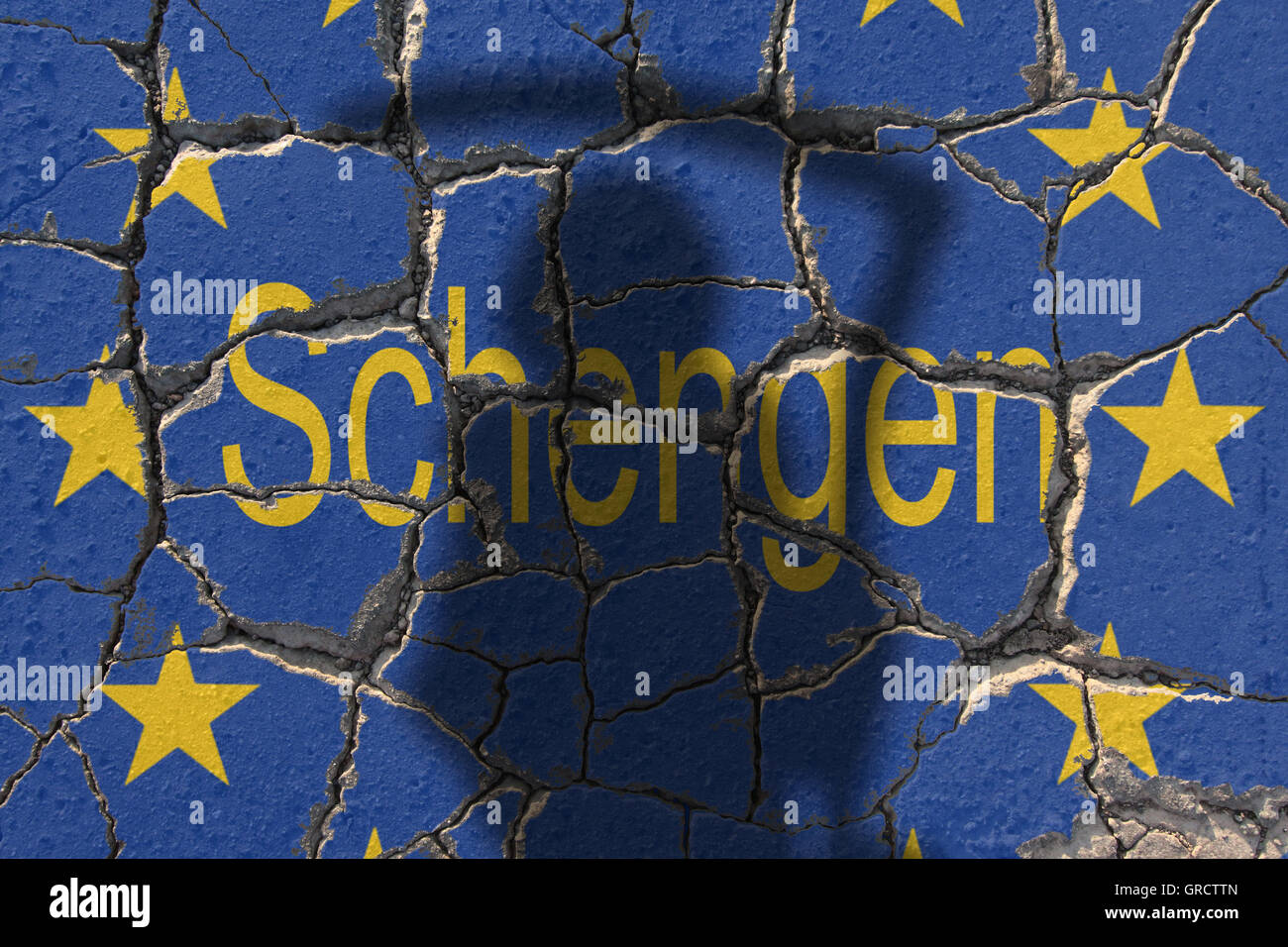 Eu Crisis With Eroding Eu Flag And Word Schengen Stock Photo