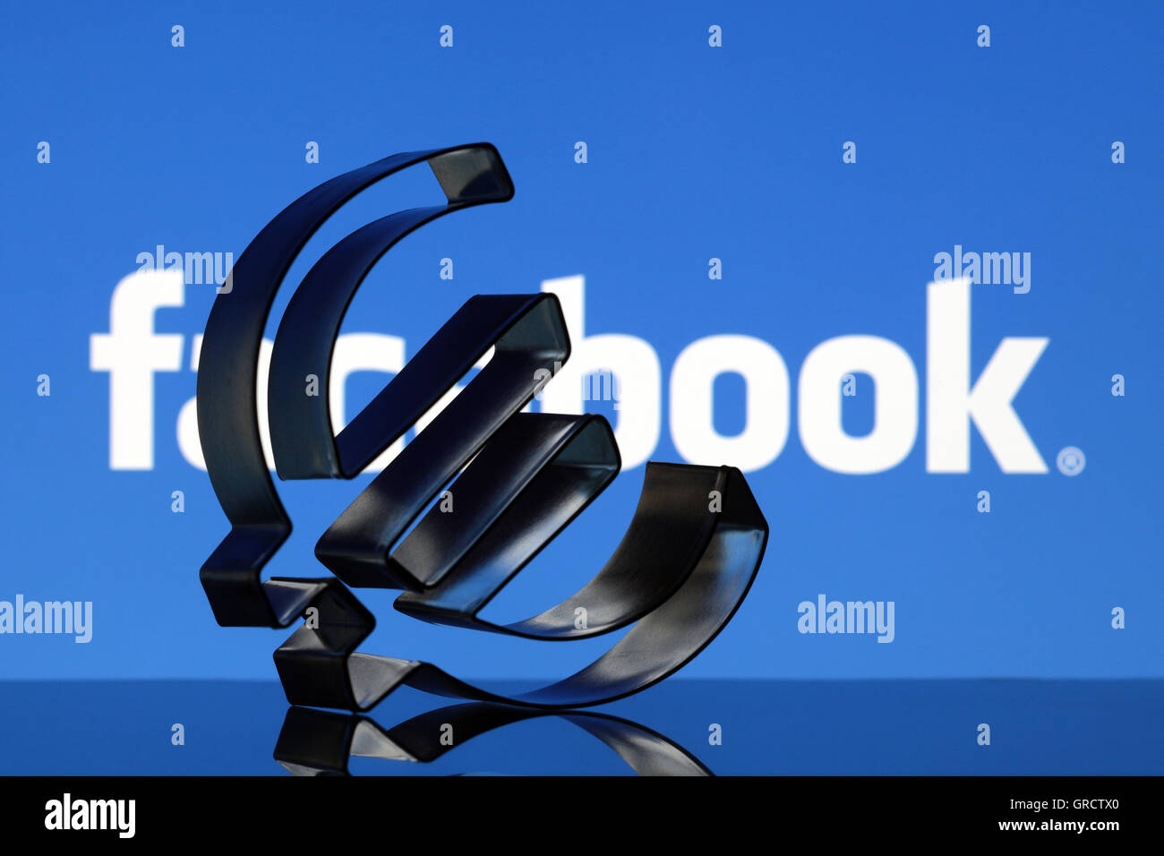 Euro Symbol With Facebbok Logo Stock Photo