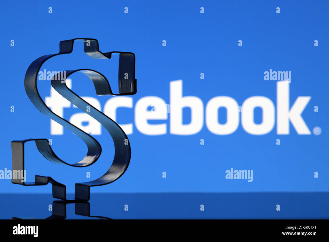 Us Dollar Symbol With Facebbok Logo Stock Photo