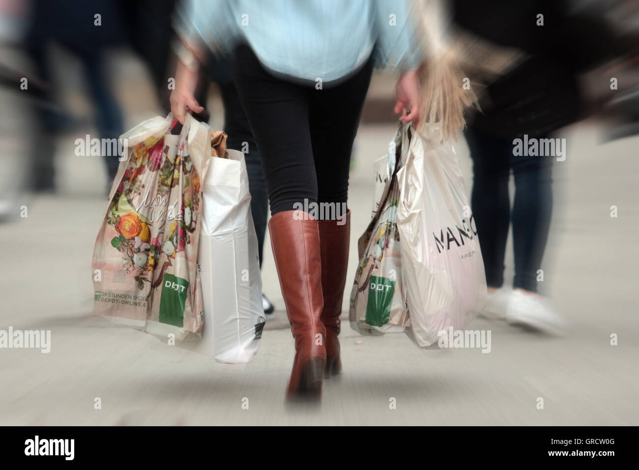 Woman carrying plastic bag hires stock photography and images Alamy