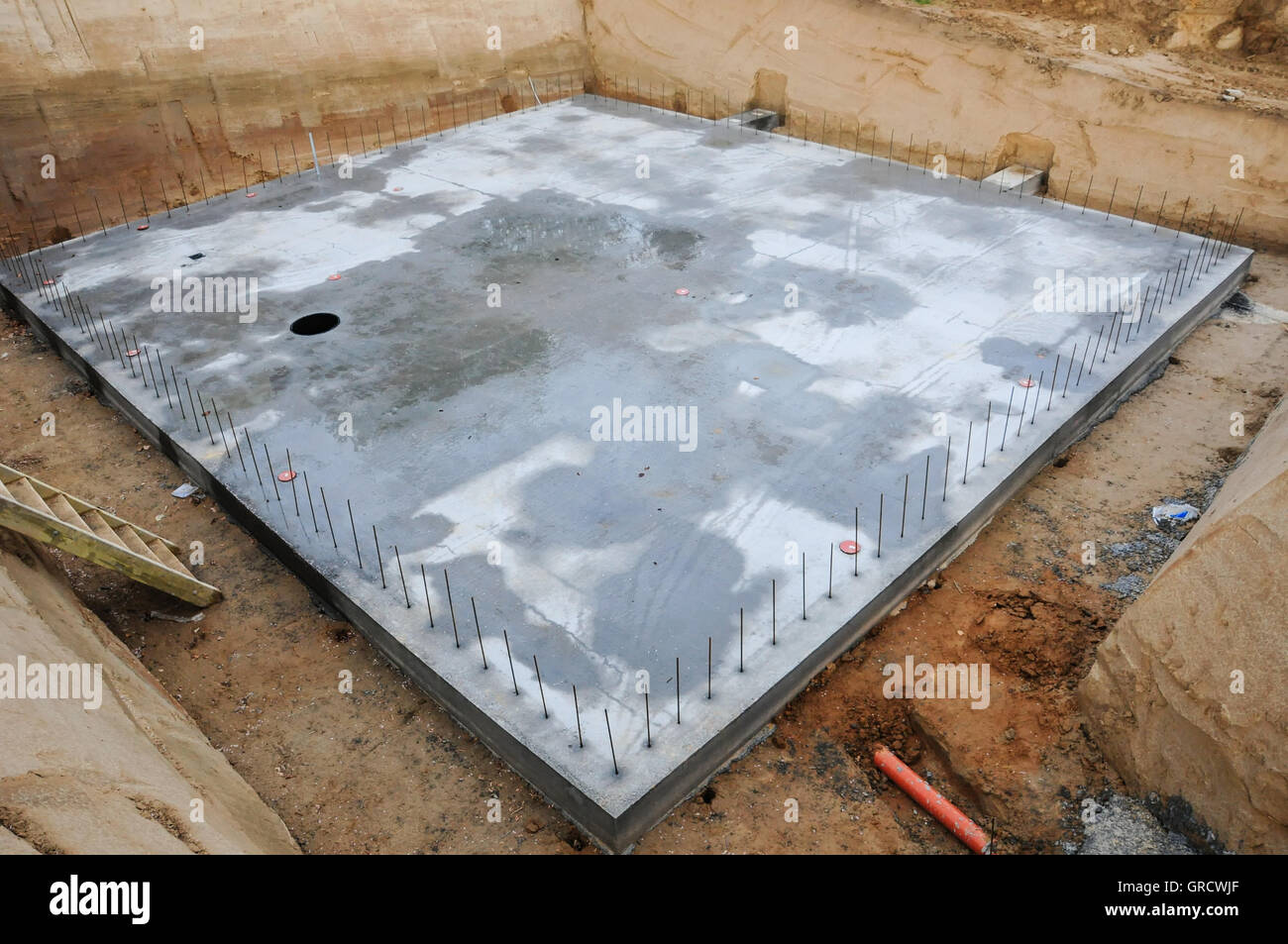 Concrete Base In An Excavation For A House Stock Photo