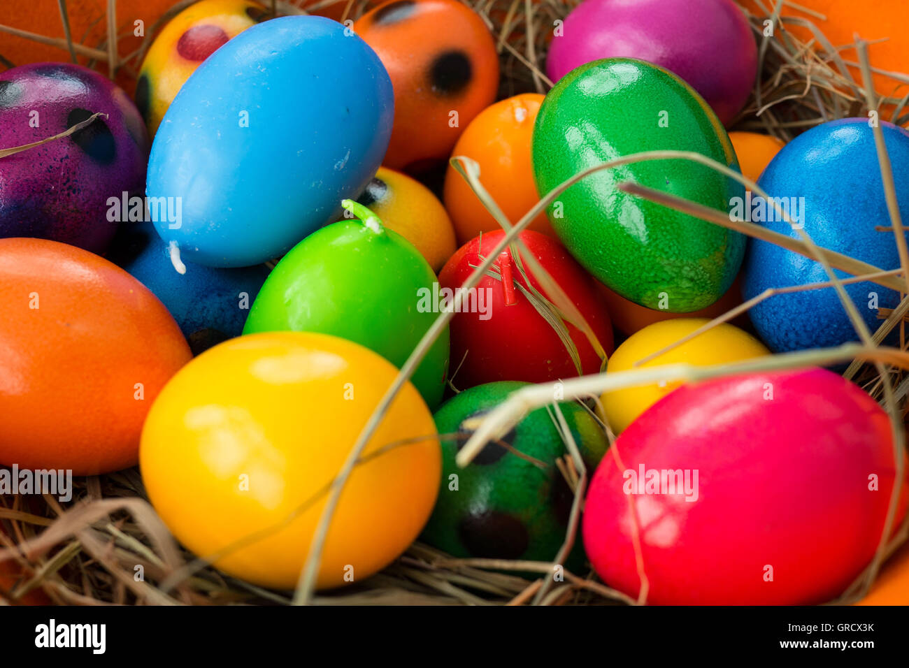 Colorful Eggs In Easter Basket Stock Photo Alamy