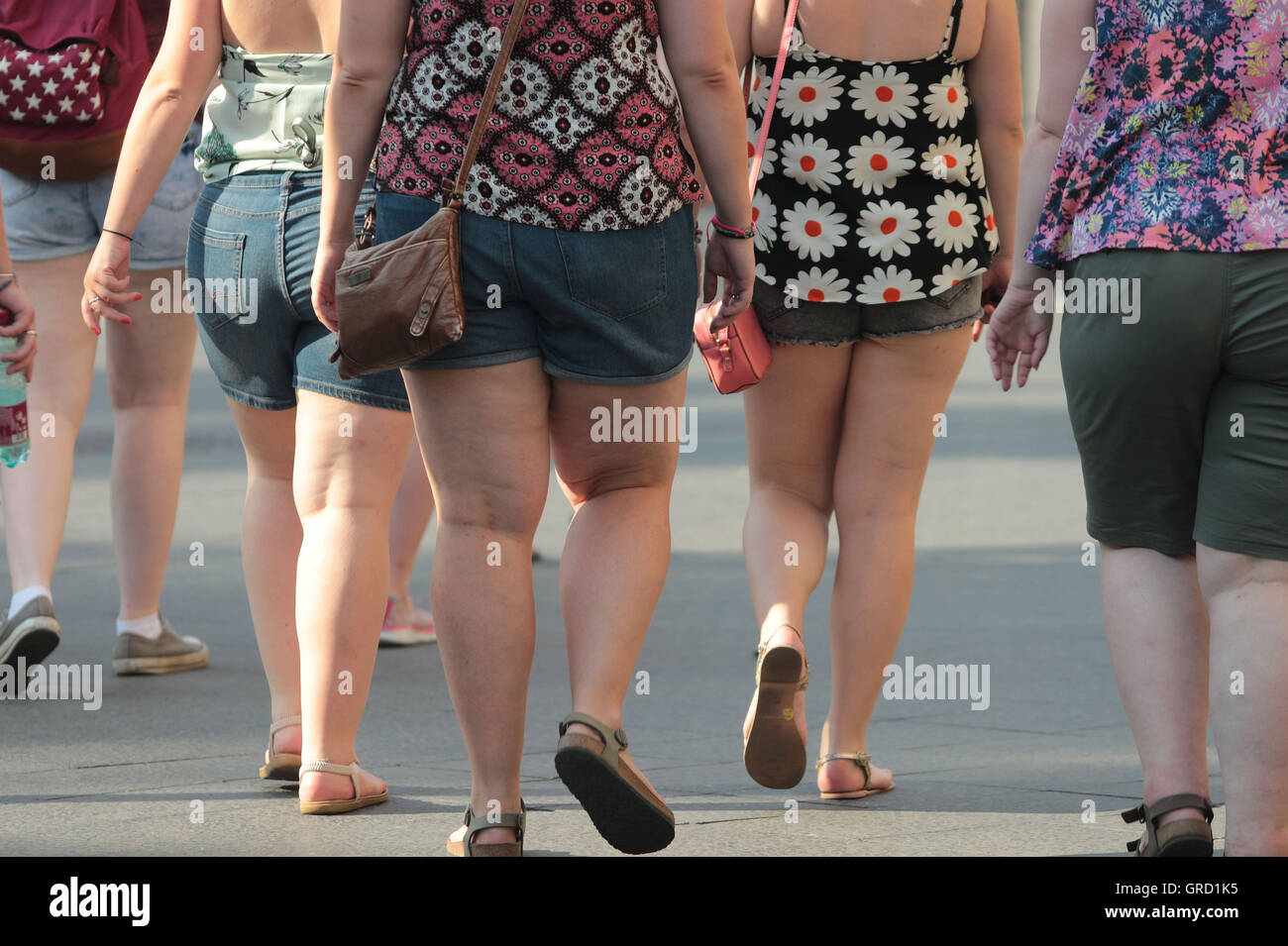 Overweight Women Wearing Shorts Walking Stock Photo