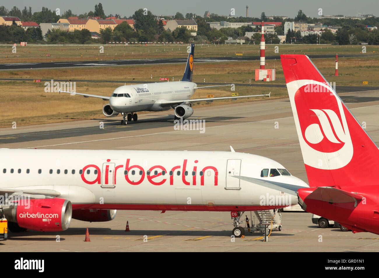 Aircrafts Of Competitors Lufthansa And Airberlin At Tegel Airport Berlin Stock Photo