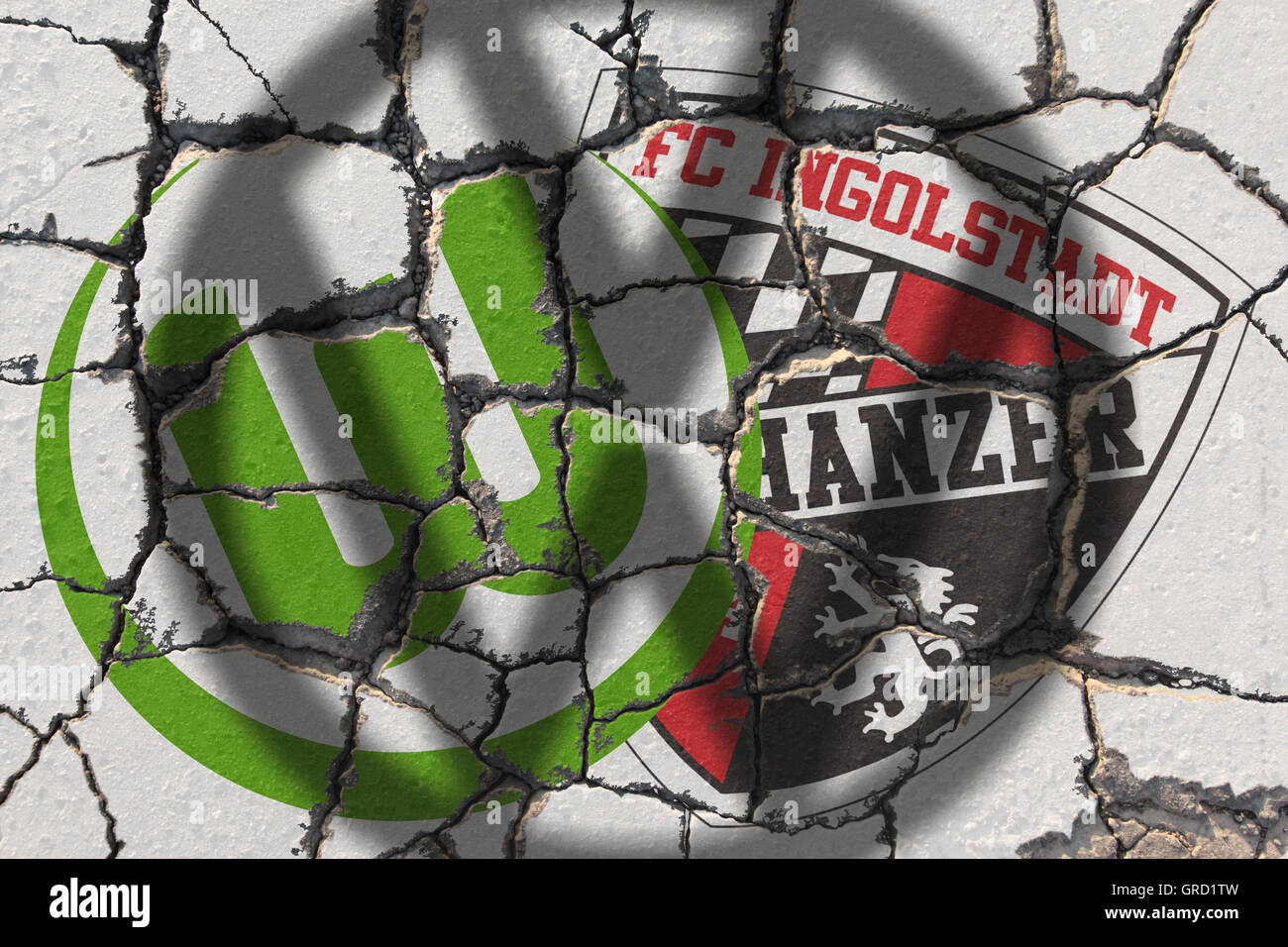 Eroding Logos Of Vfl Wolfsburg And Fc Ingolstadt With Shadow Of Vw Sign Stock Photo