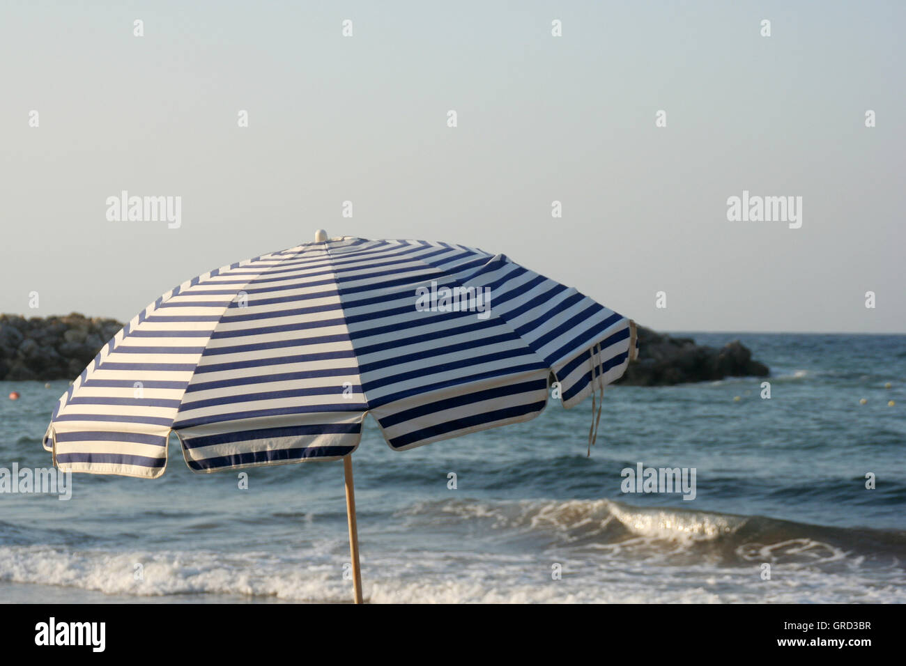 Parasol At The Beach Stock Photo - Alamy