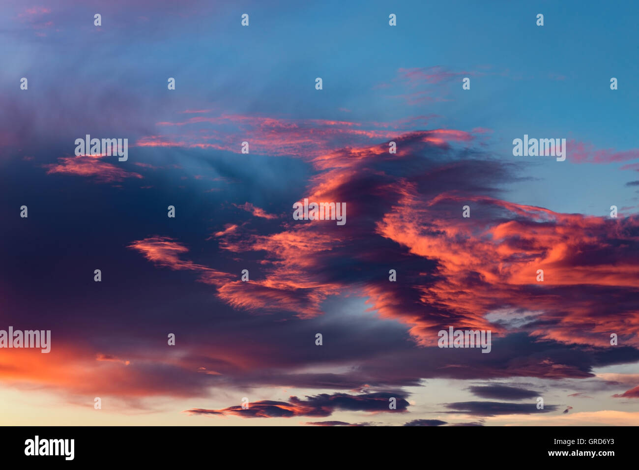 Dramatic Red Clouds on Twilight Sky Background Stock Photo