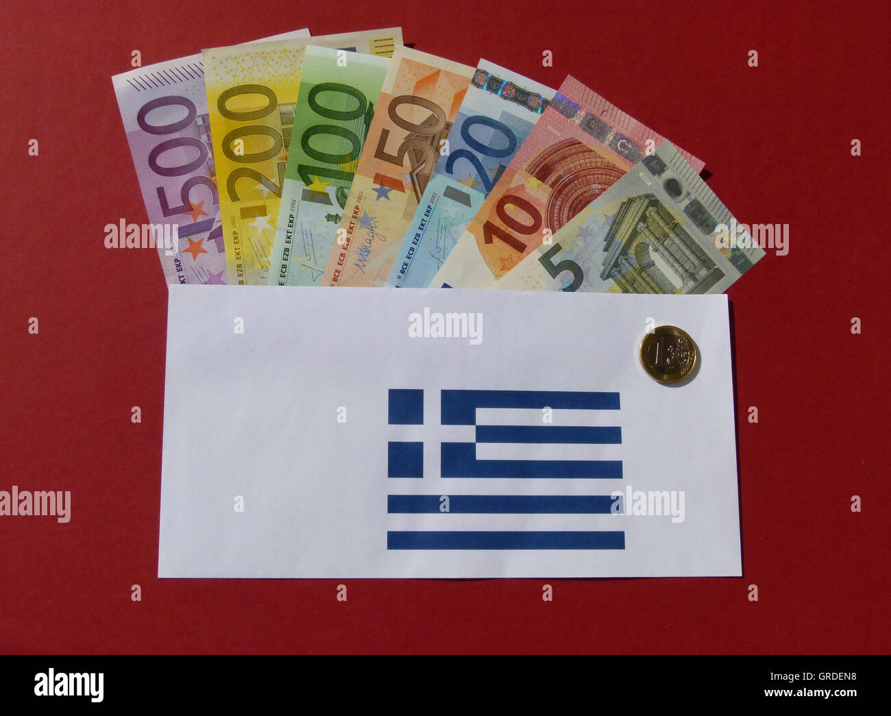 Symbol Concerning Aid To Greece, Euro Banknotes In An Envelope Stock Photo